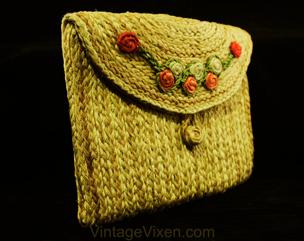 Braided raffia clutch bag